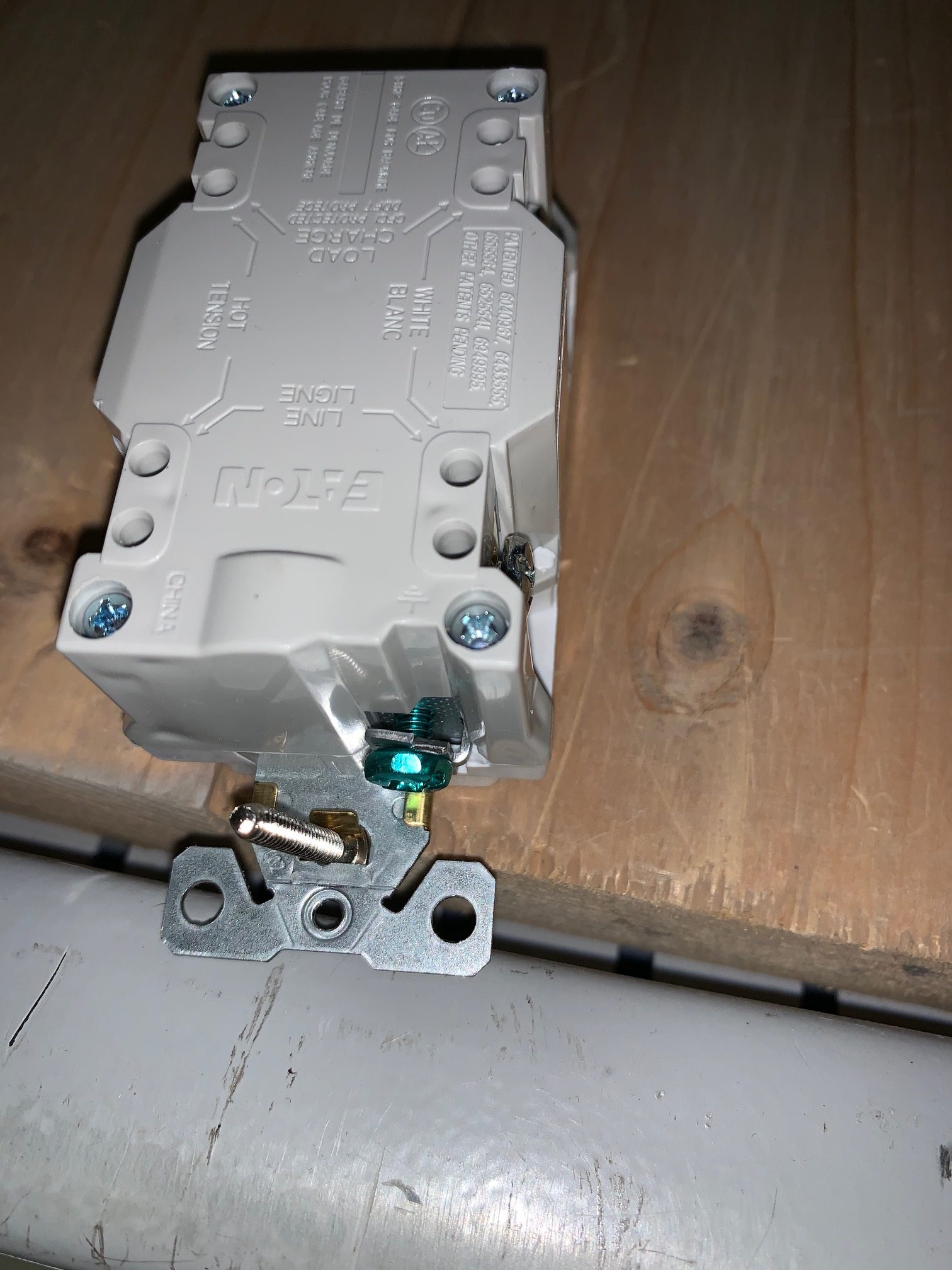 base wire connects to gold screw