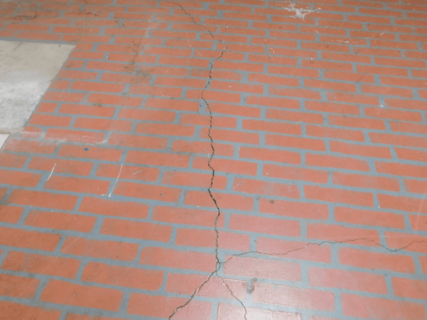 hump in concrete- foundation settling
