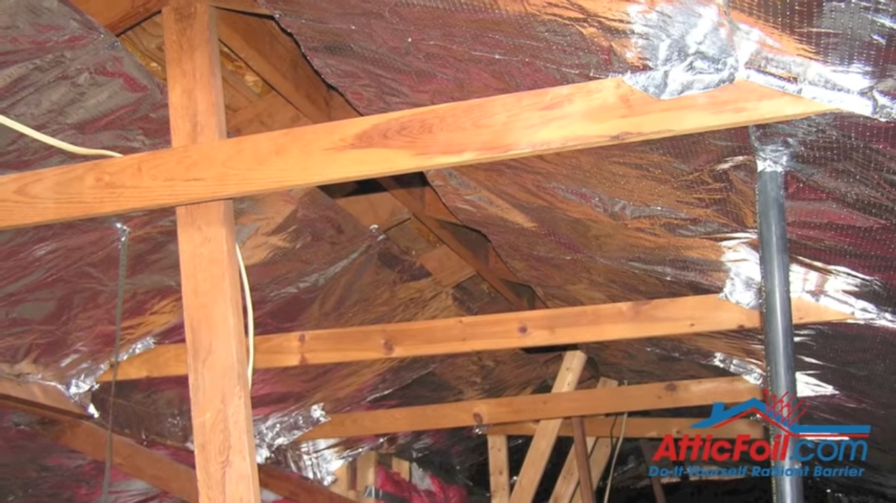 Radiant barriers attached to the underside of the rafters